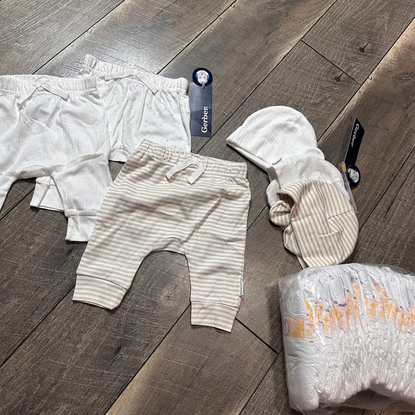 Baby Lot + bag of size 1 diapers