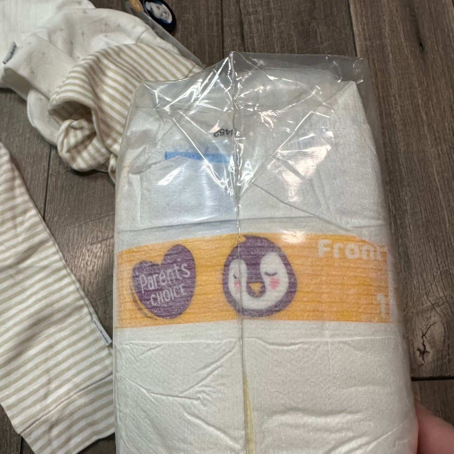 Baby Lot + bag of size 1 diapers