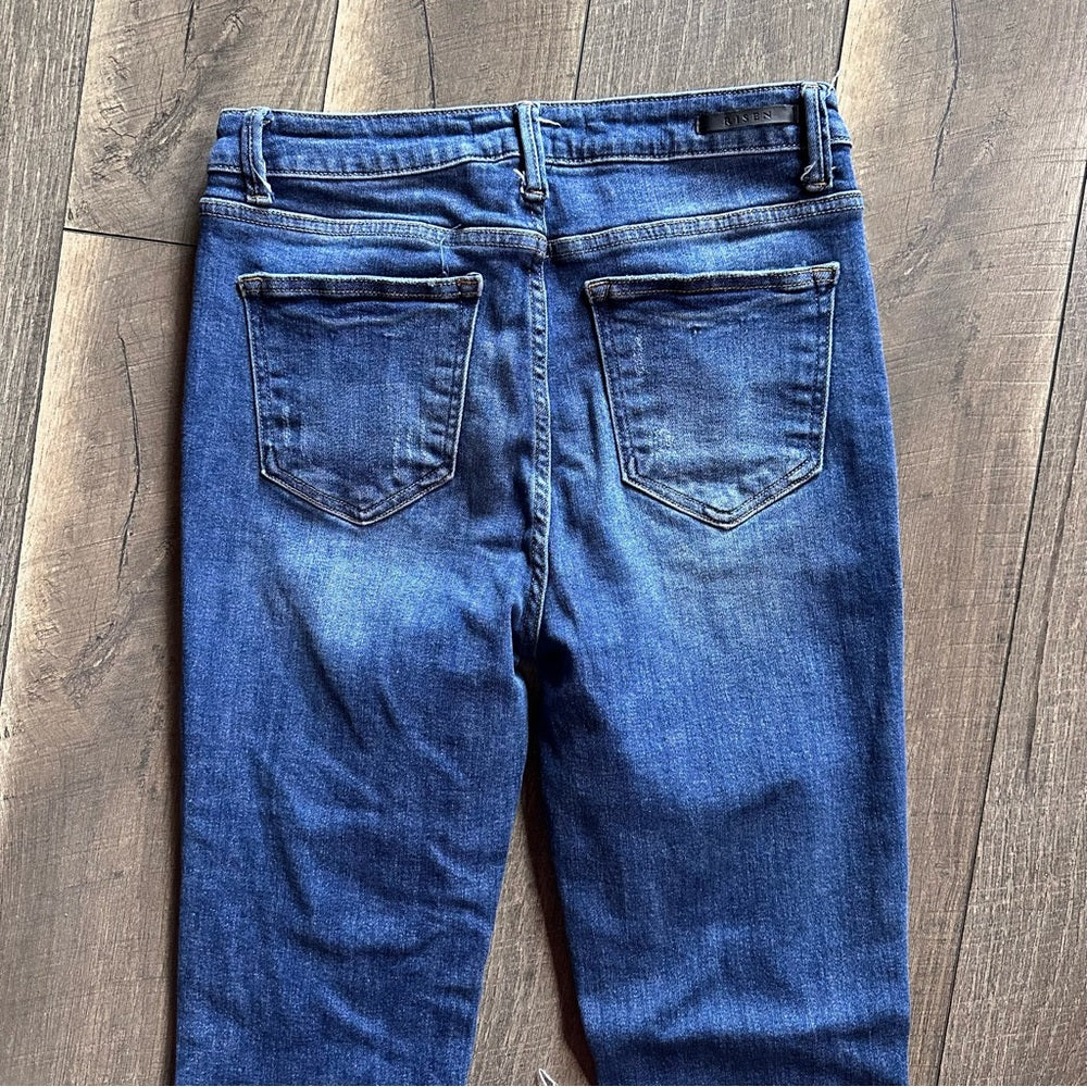 Risen Hi Rise Distressed Relaxed Skinny Jeans