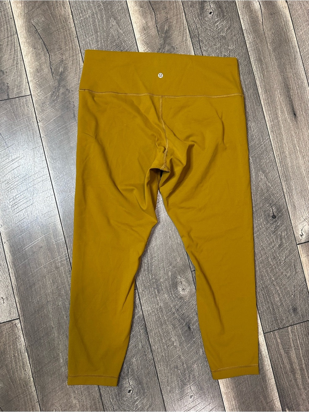 Lululemon Wunder Train High-Rise Tight 25"
Gold Spice
