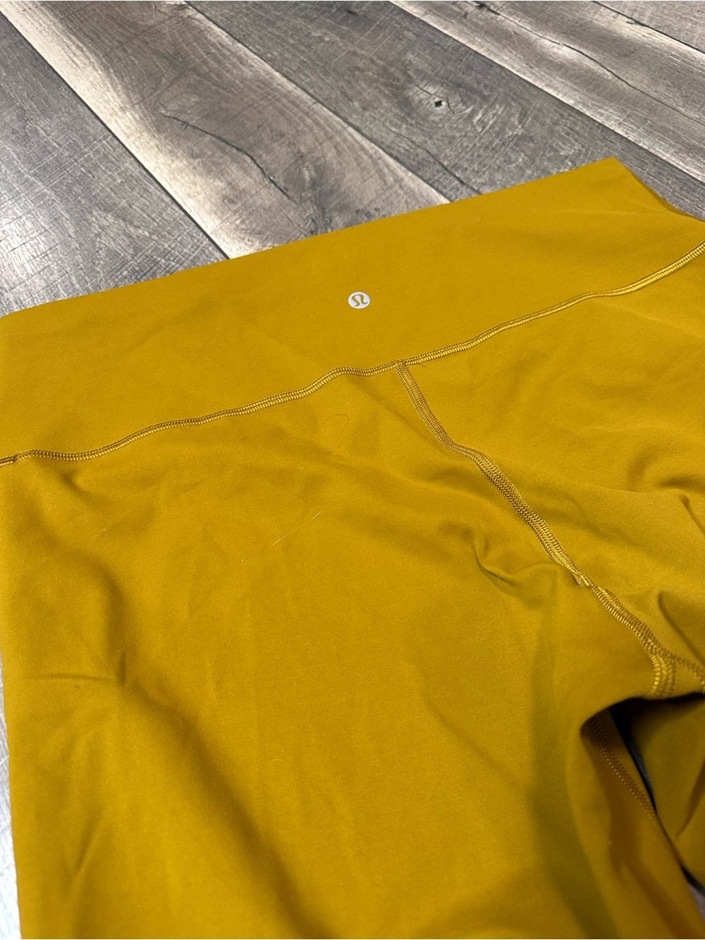 Lululemon Wunder Train High-Rise Tight 25"
Gold Spice