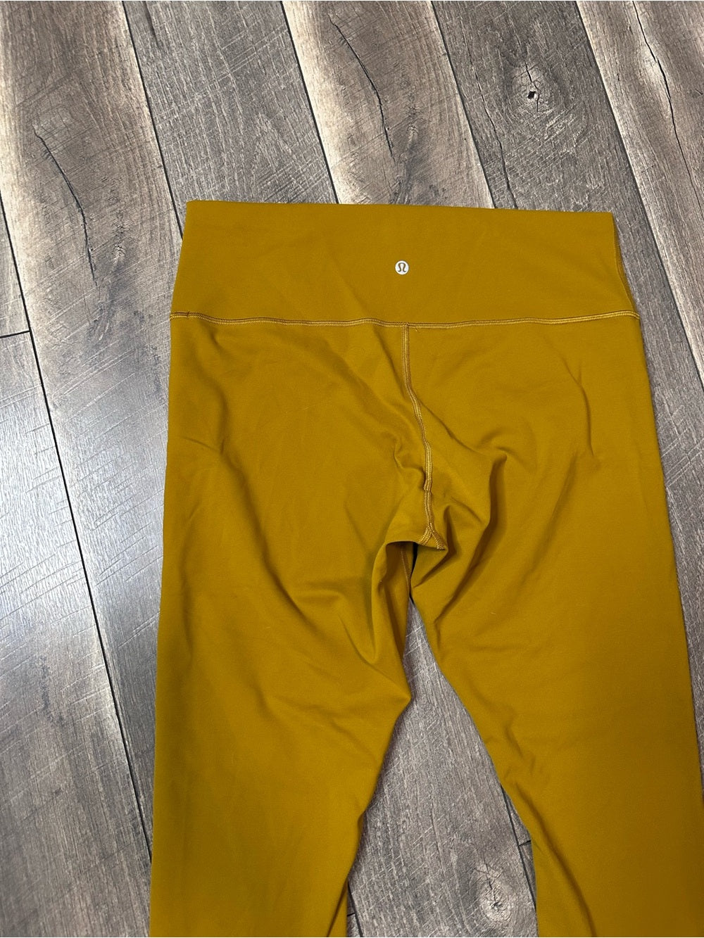 Lululemon Wunder Train High-Rise Tight 25"
Gold Spice