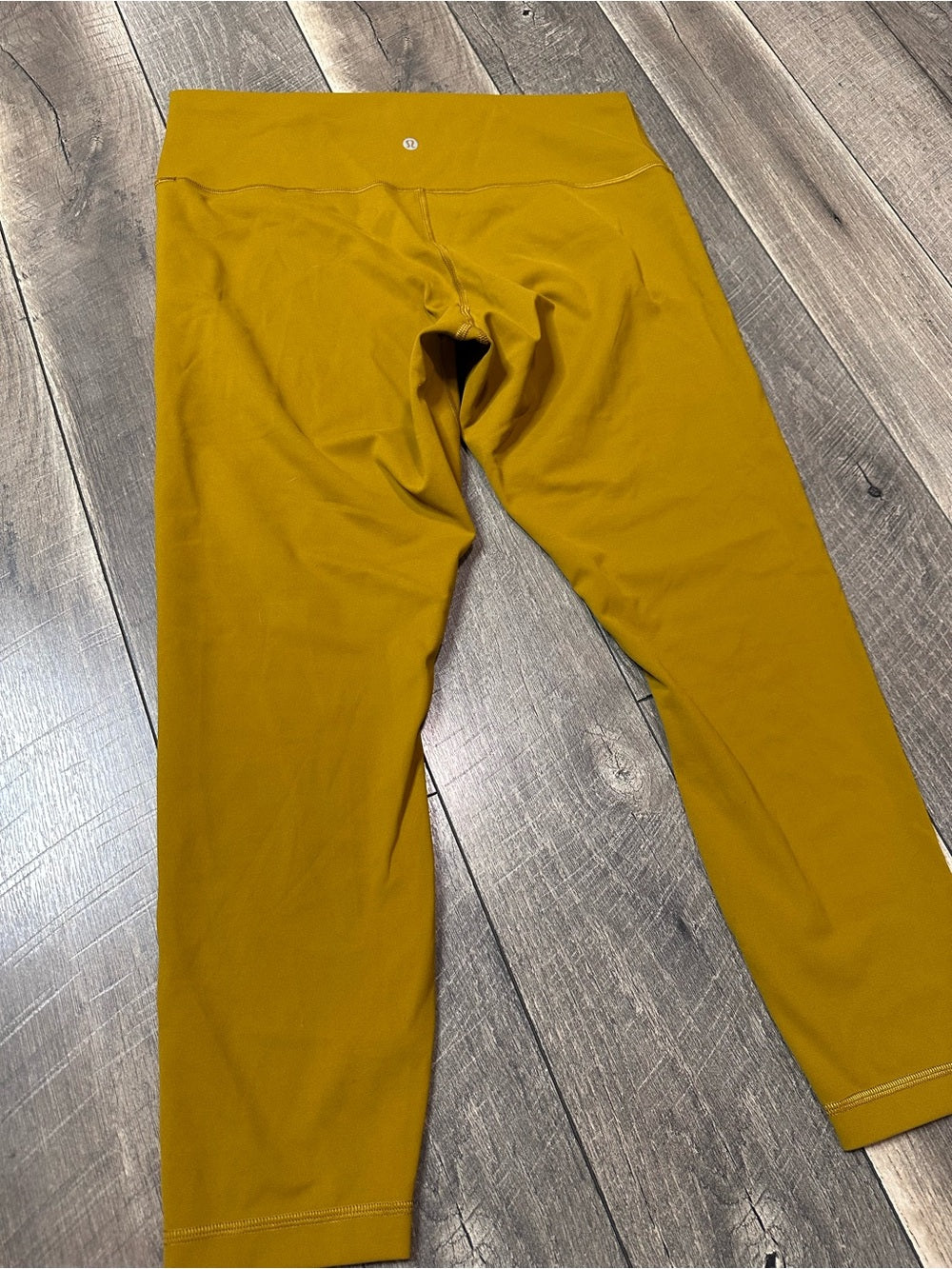 Lululemon Wunder Train High-Rise Tight 25"
Gold Spice