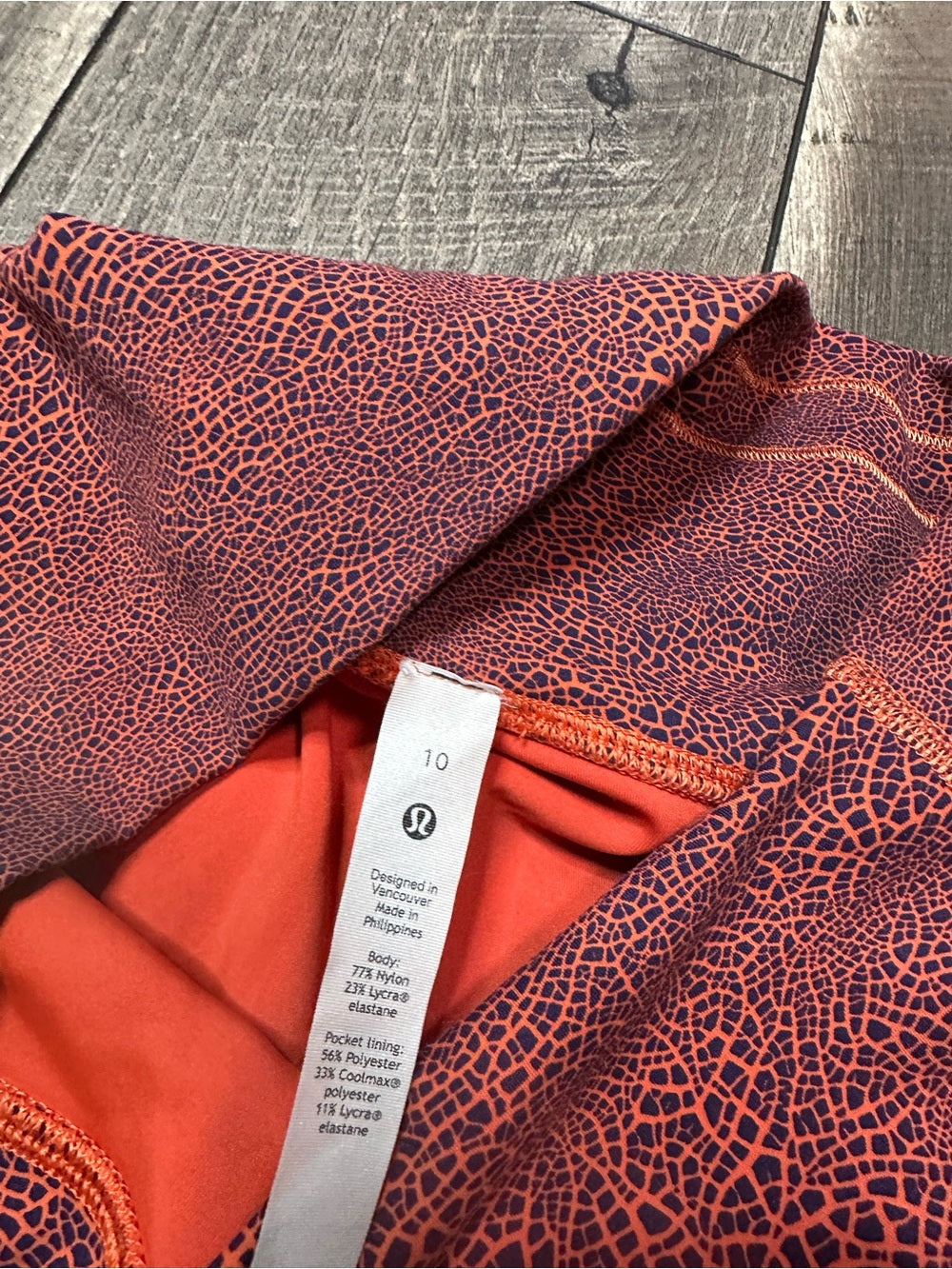 Lululemon Wunder Train High-Rise Tight 25"
Crackle Glaze Vintage Orange Larkspur